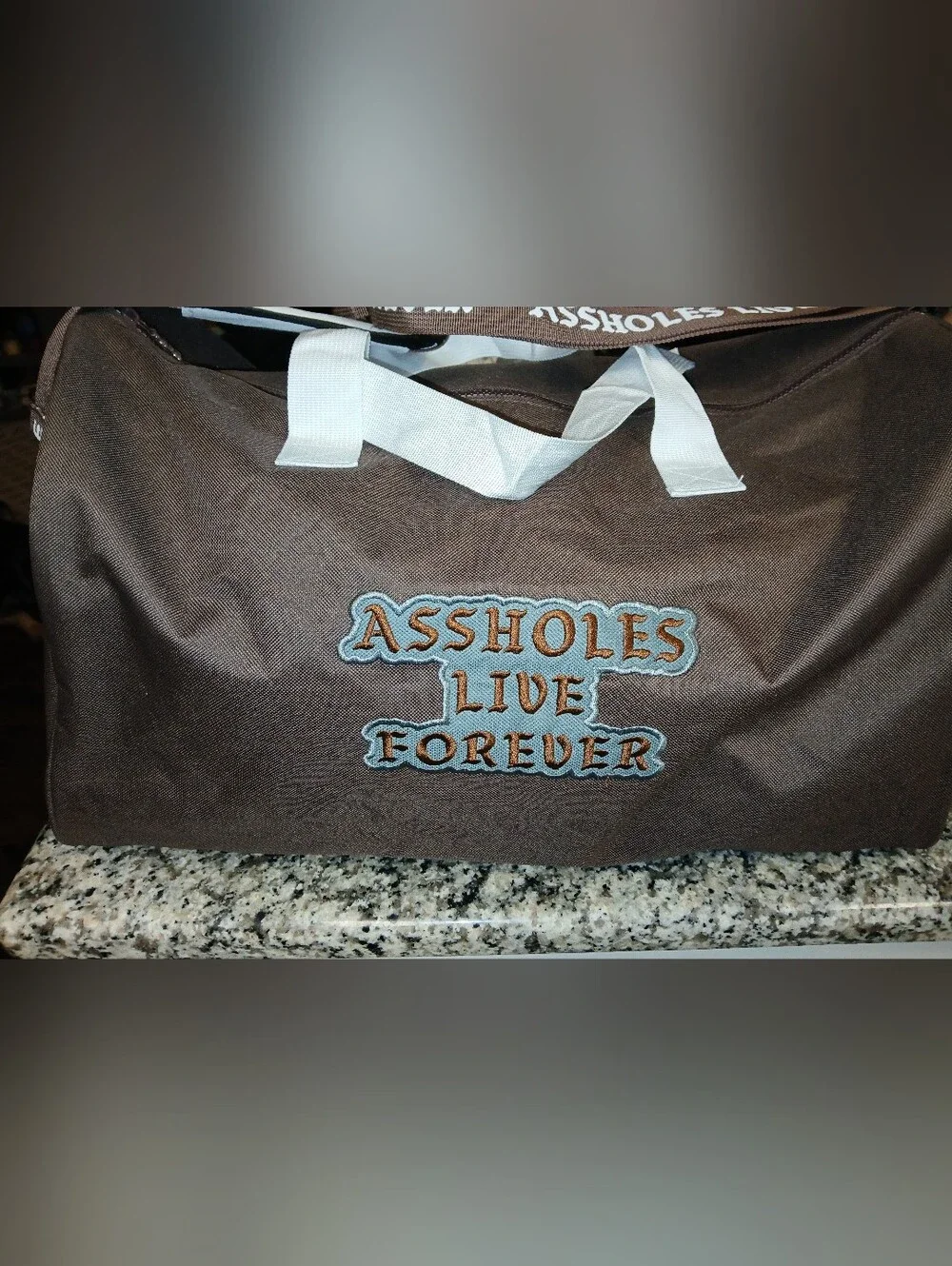 New Without Tags ASSHOLES*S LIVE FOREVER - Emotional Baggage Duffle Bag Brown